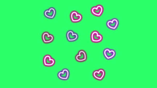 欢快的粉色心形在绿色背景下飘浮在情人节 — 图库视频影像