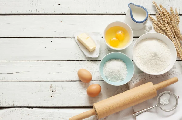 Rustic kitchen - dough recipe ingredients on white wood — Φωτογραφία Αρχείου