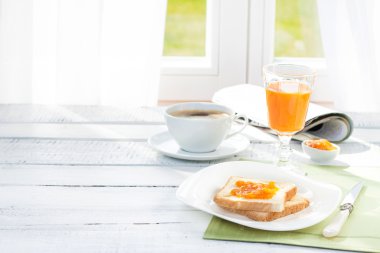 Continental breakfast - coffee, orange juice and toast