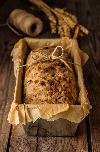 Rustic bread in baking tin - vintage kitchen