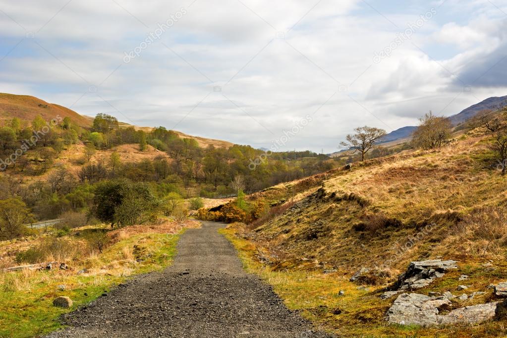 Rural gravel road in Scottish Highlands, West Highland Way. Beau