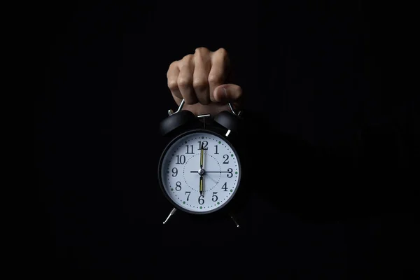 Human Hand Holding Alarm Clock Dark Copy Space — Stock Photo, Image