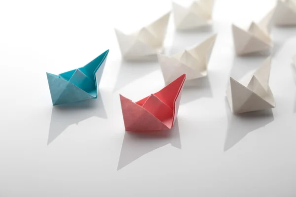 Leadership concept using blue paper ship — Stock Photo, Image