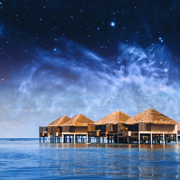 Villa chalets aux Maldives. Éléments de cette image fournis par la NASA — Photo