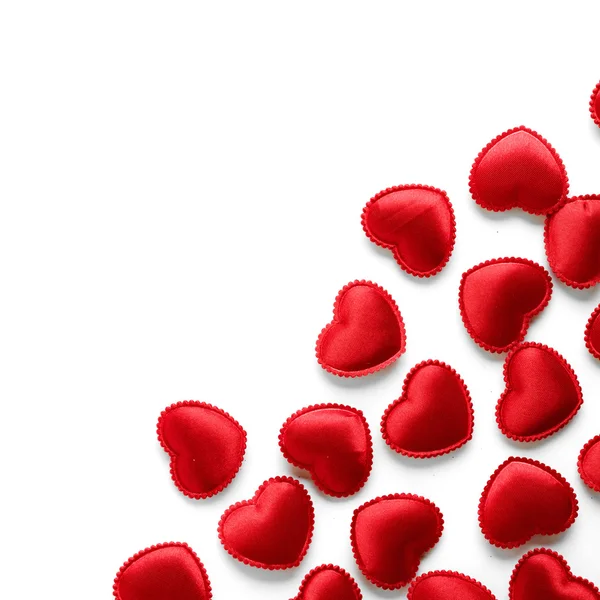 Fieltro corazones rojos aislados sobre un fondo blanco —  Fotos de Stock