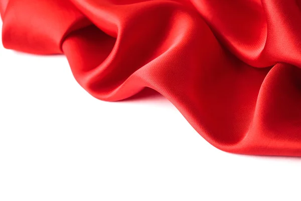 Pano vermelho sobre um fundo branco — Fotografia de Stock