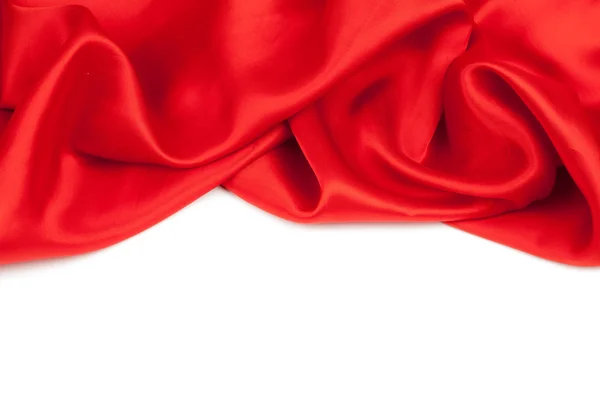 Red satin fabric against white background — Stock Photo, Image