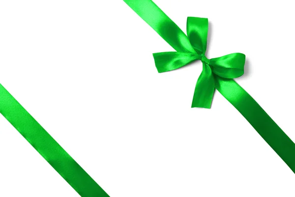 Shiny green satin ribbon on white background — Stock Photo, Image