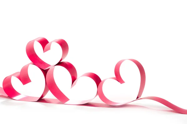 Ribbons shaped as hearts on white — Stock Photo, Image