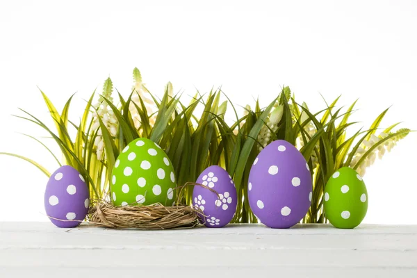 Easter eggs hidden in the grass — Stock Photo, Image