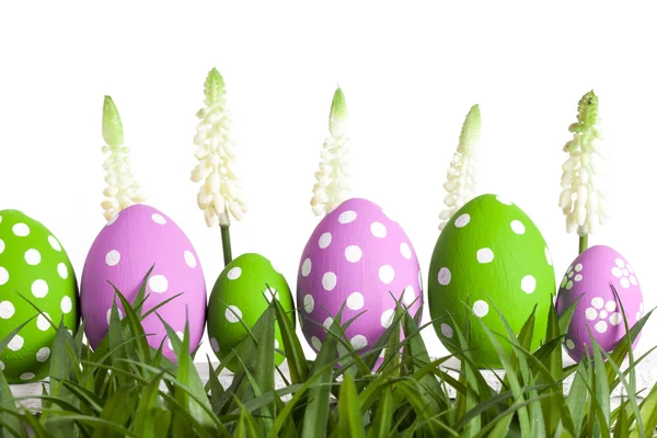 Easter eggs lying on the meadow — Stock Photo, Image