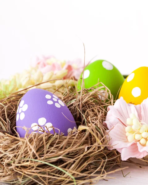 Colorful easter eggs with white points — Stock Photo, Image