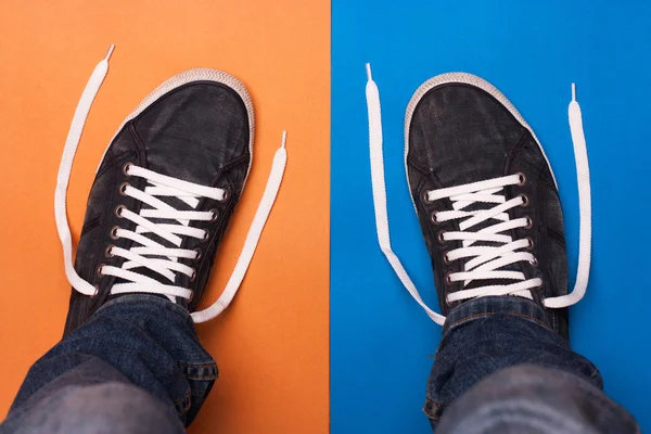 stylish blue gym shoes with white laces