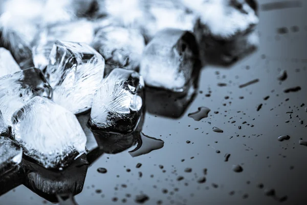 Ice on black background — Stock Photo, Image
