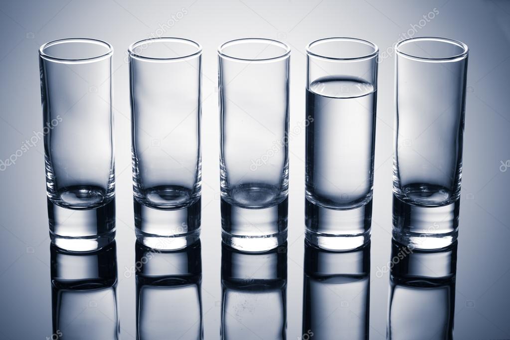 row of glasses for vodka