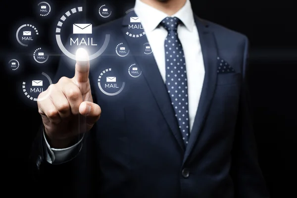 Businessman clicking on email icon — Stock Photo, Image