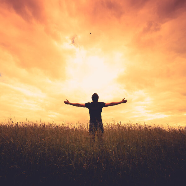 Silhouette of man and sunshine