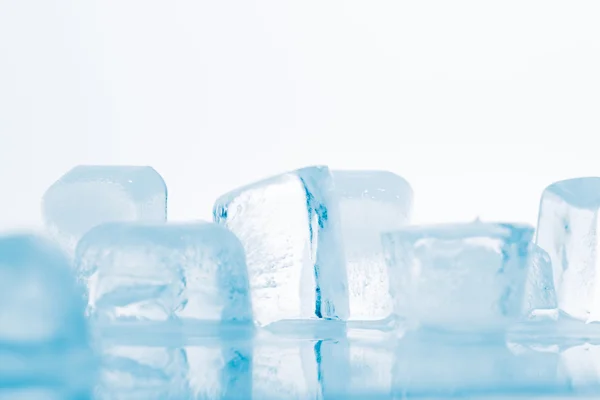Ice cubes on a white background