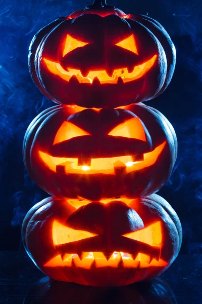 Terrible pumpkin on black background — Stock Photo, Image