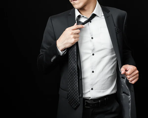 Man in suit on a black background — Stock Photo, Image