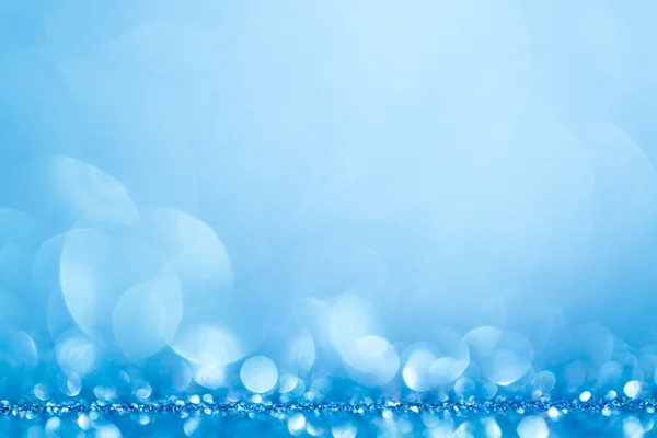 青いボケ抽象的な光の背景 — ストック写真