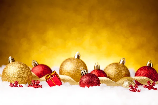 Golden and red christmas ball — Stock Photo, Image