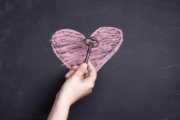 Chalk heart drawing and key — Stock Photo, Image