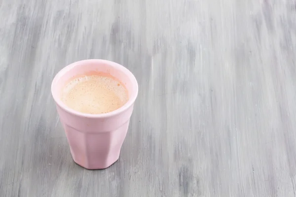 A cup of espresso coffee on a wooden background — Stock Photo, Image