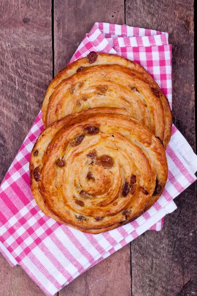 Sweet bun with raisin — Stock Photo, Image