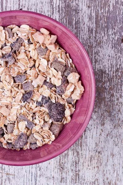 Muesli in bowl on table — Stock Photo, Image