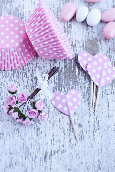 Dulces recubiertos de azúcar, tazas para hornear magdalenas —  Fotos de Stock