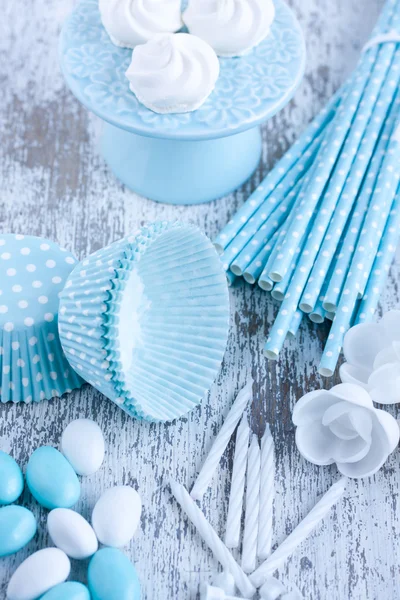 Meringues, Sugar coated candies, cupcake baking cups — Stock Photo, Image