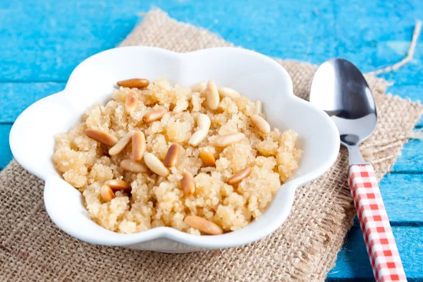 Semolina halvah with pine nut — Stock Photo, Image