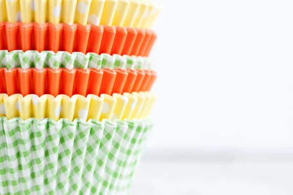 Colourful paper baking cups — Stock Photo, Image