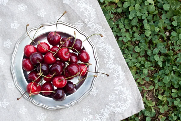 Cherry fruits on a plate — Stock Photo, Image