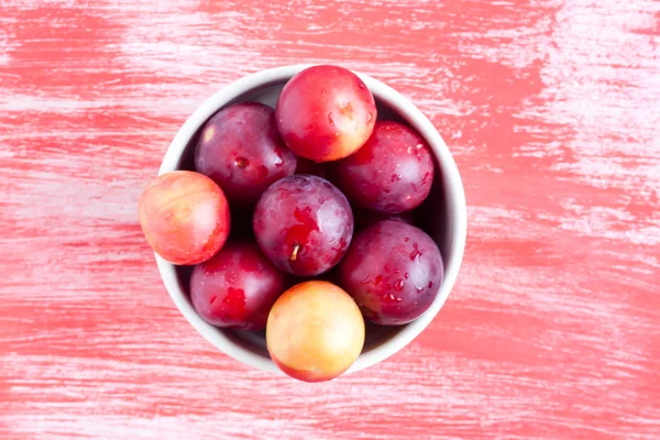 Plums in a bow close up — Stock Photo, Image