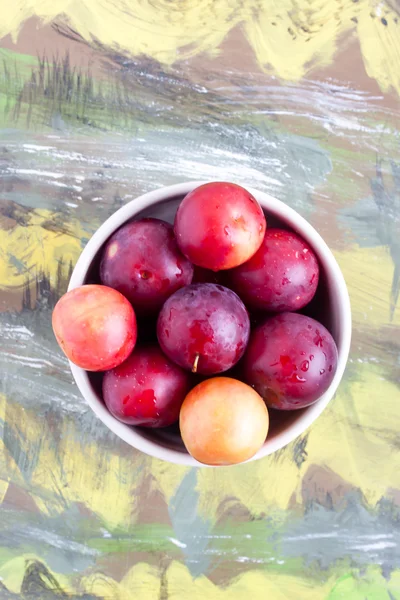 Plums in a bow close up — Stock Photo, Image