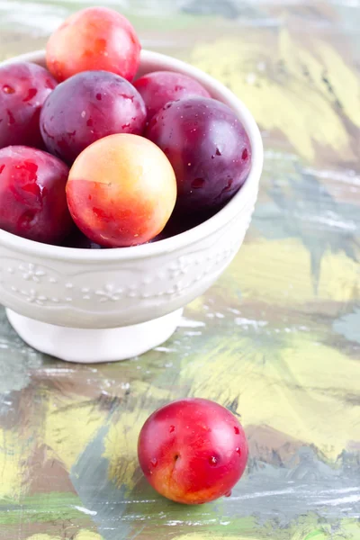 Plums in a bow close up — Stock Photo, Image