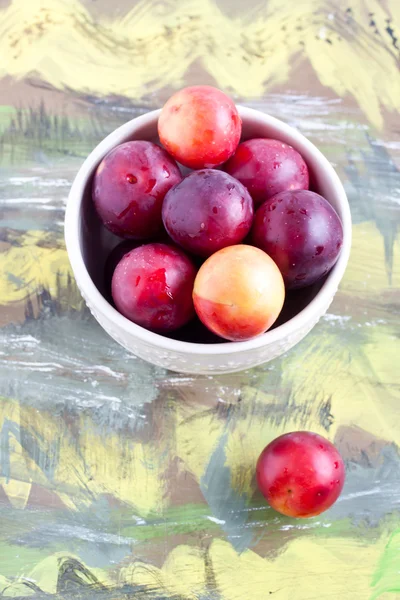 Plums in a bow close up — Stock Photo, Image