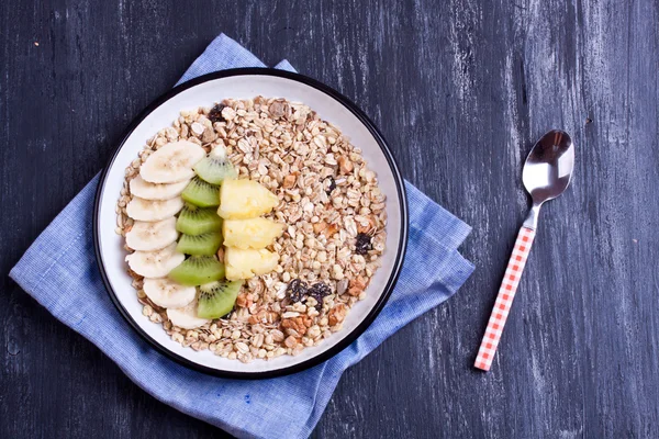 Plate of Muesli with fruit — Stock Photo, Image