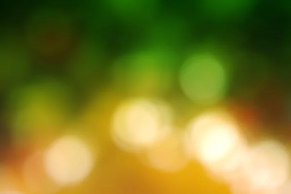 Latar belakang bokeh kuning, jingga dan hijau abstrak — Stok Foto