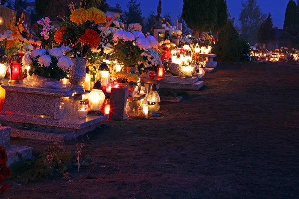 Cemetary decorated with candles for All Saints Day at night — Stock Photo, Image