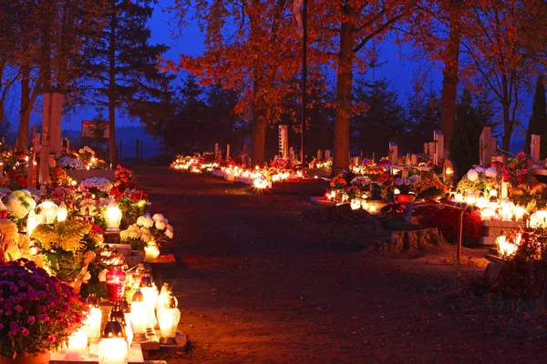 Cemetary decorated with candles for All Saints Day at night — Stock Photo, Image