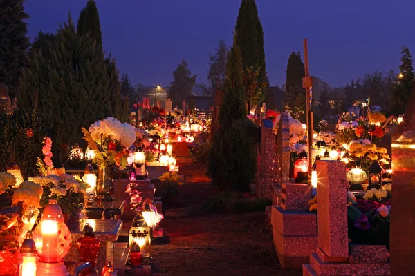 Cemetary decorated with candles for All Saints Day at night — Stock Photo, Image