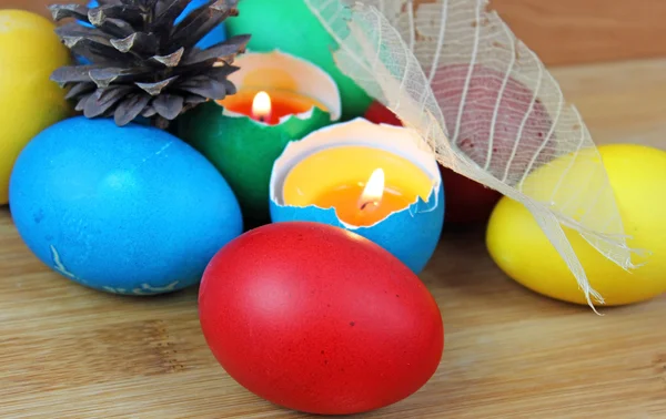 Easter eggs-candles with over eggs — Stock Photo, Image