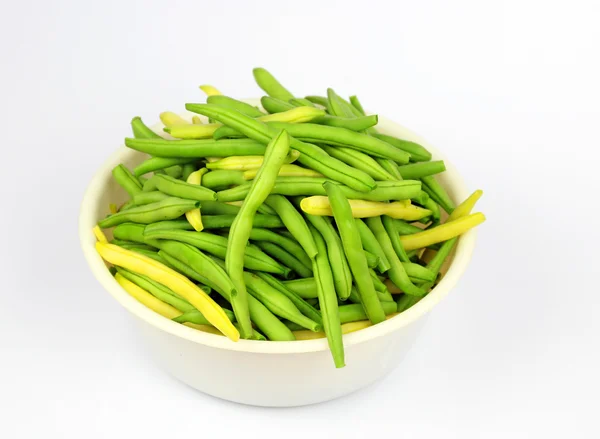 Fresh green and yellow beans in a white container . — Stock Photo, Image