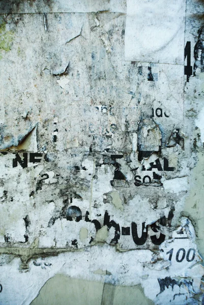 Papel de textura de colagem de fundo aleatório na parede erodida — Fotografia de Stock