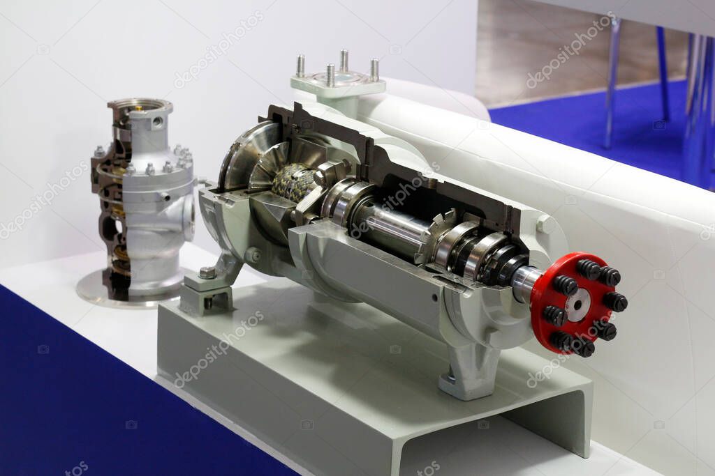 Detail of an electric high pressure centrifugal pump for industry. Sectional turbopump installation. Electric pump unit.