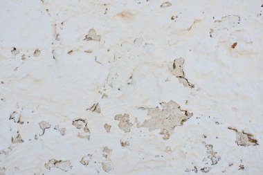 Old painted white wall. Ancient windmill cover. Consuegra, Toledo, Spain