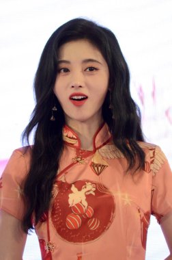 Chinese singer, dancer, and actress Ju Jingyi attends a promotional event in Shanghai, China, 2 November 2020. clipart